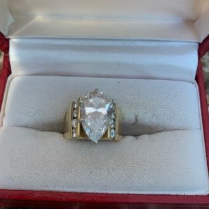 14 karat yellow gold, 8 diamond channel set ring,